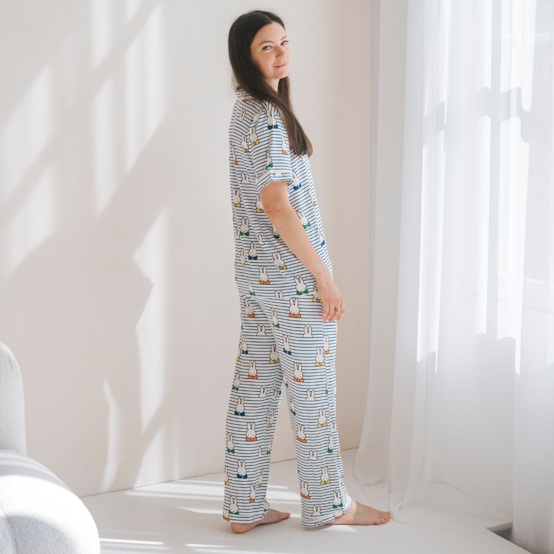 Woman wearing the Ladies Miffy Peek-a-Boo Blue bamboo pyjama set