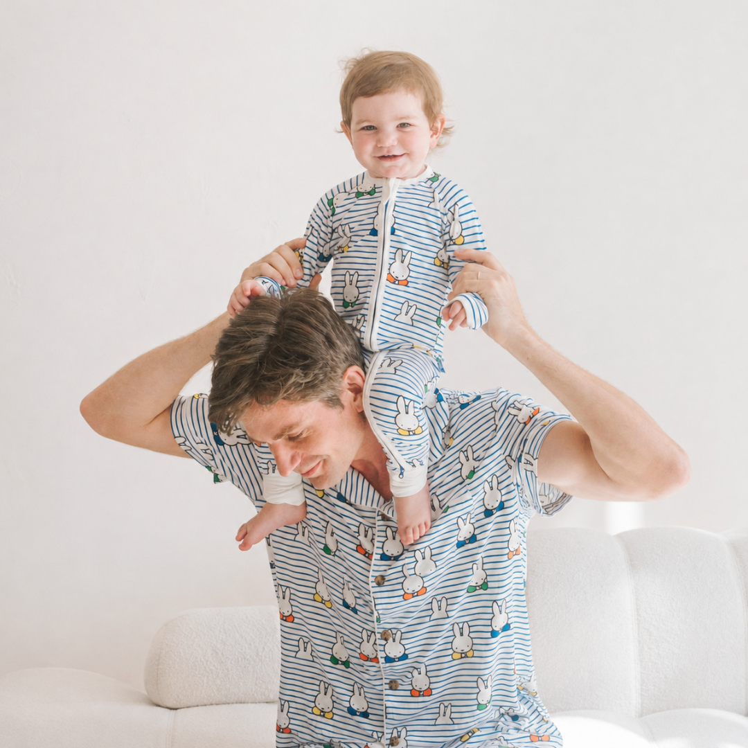 Baby wearing the ZIPSTER x Miffy Peek-a-Boo Blue bamboo babygrow