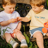 Oversized kinder T-shirt geel Slow Days