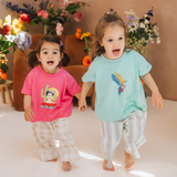 Übergroßes Kinder-T-Shirt in Mint mit Frida-Papagei